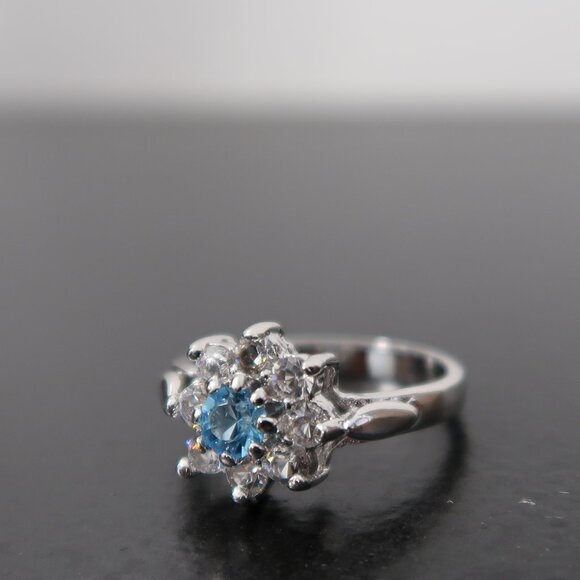 Source Unknown Jewelry - Woman's Silver Tone Ring Light Blue Stone with White Stones Size 5.75